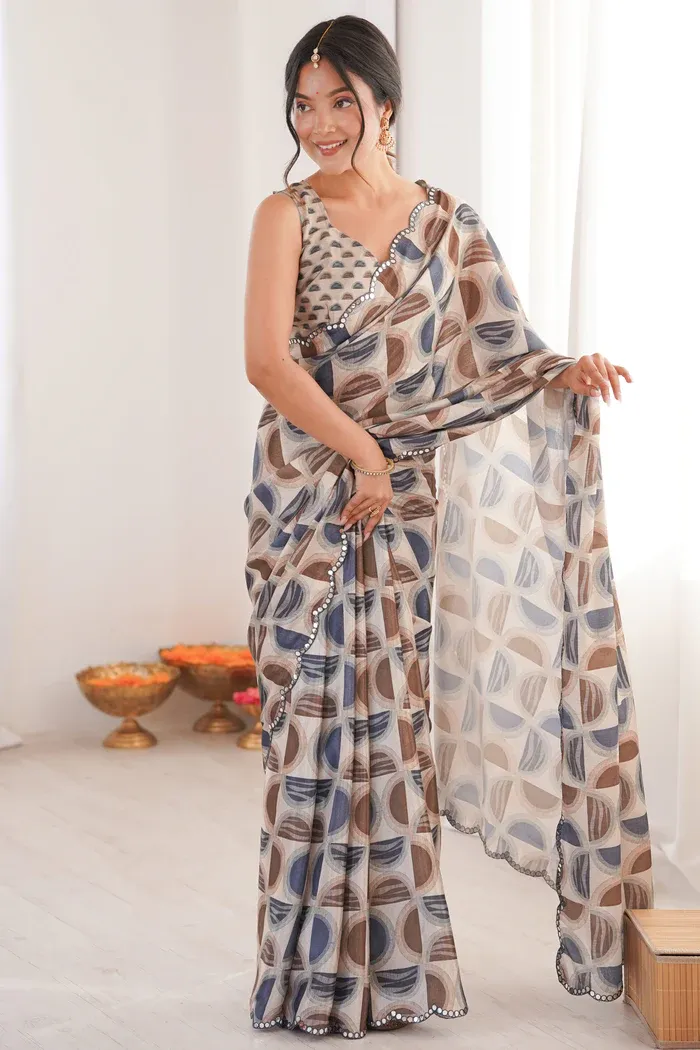 Timeless Multicolor Geometric Digital Printed Chanderi Silk Saree With Refined Lace Border.